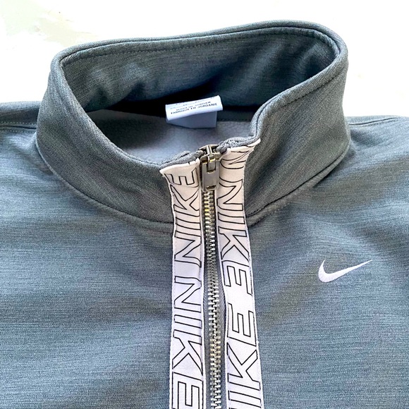 Nike Tops - Womens Silver Grey Nike pullover sweatshirt with a zippered front. Size XS